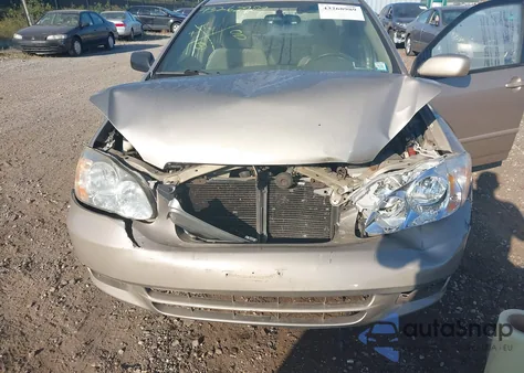 2004 Toyota Corolla Le z USA, uszkodzony, nr VIN 2T1BR38E74C208601